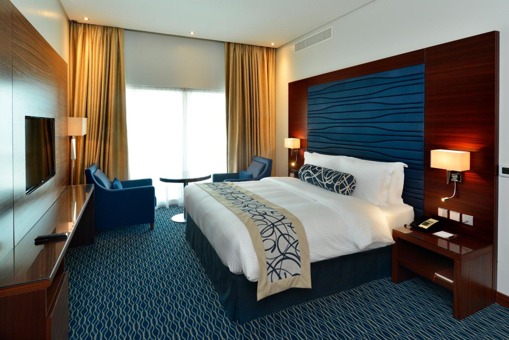 Ramada By Wyndham Manama City Centre Exterior photo
